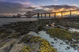 Lothian Prints: Sunrise through the Forth Rail Bridge, UNESCO World Heritage Site, on the Firth of Forth