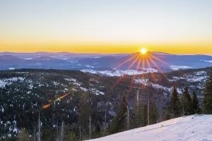 Wintry Landscape Prints: Sunrise over the hills of czech republic from Mount Lusen wth the view over the hills of the bavarian forest in winter