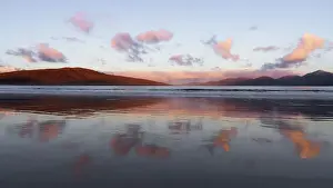 Taransay Prints: Sunrise over the island of Taransay and the North Harris hills from Luskentyre Beach