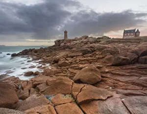 Direction Gallery: Sunrise long exposure at Ploumanach lighthouse and a house over the pink granite coast