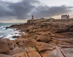 Cotes Darmor Prints: Sunrise long exposure at Ploumanach lighthouse and a house over the pink granite coast