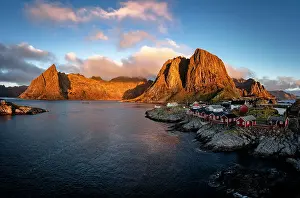 Hamnoy Prints: Sunrise over majestic mountains surrounding Hamnoy village