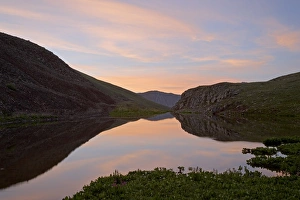Images Dated 25th July 2007: Sunrise reflection in a pond downstream of Clear Lake, San Juan National Forest