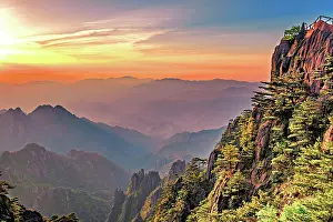 West Prints: Sunrise reveals the beauty of Huangshan as the sky changes colors over the mountains