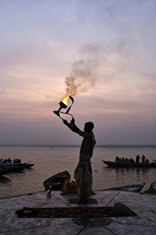 Ritual Prints: Sunrise ritual at the River Ganges, Varanasi (Benares), Uttar Pradesh, India, Asia