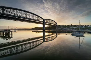 Connections Gallery: Sunrise over the Royal Albert Bridge which spans the River Tamar in Saltash, Cornwall, England