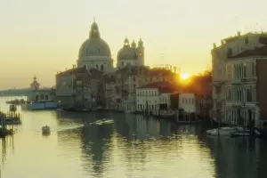 Sunrise behind Santa Maria Della Salute church from Academia Bridge