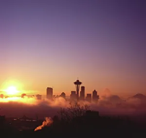 Washington Prints: Sunrise over silhouette of Seattle skyline and Mt. Rainier, Seattle, Washington