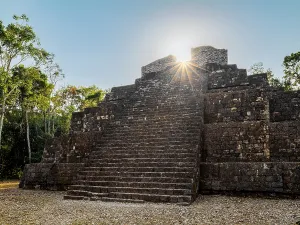 Moss Prints: Sunrise over the stepped ruins of the Maler Group in Yaxha
