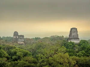 Guatemala Prints: Sunrise over temples i, ii, and iii in tikal, peten department, guatemala