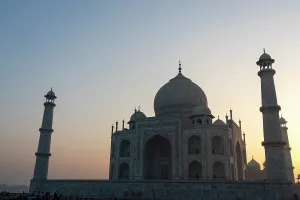 Iconic Prints: Sunrise view of Taj Mahal with people exploring the site in Agra, Uttar Pradesh, India