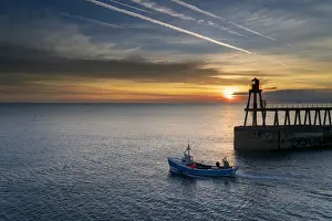 Sunrise over Whitby harbour and River Esk in mid-September 2018
