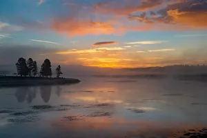 Sunrise over Yellowstone Lake with reflection, Yellowstone National Park