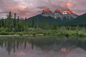 Flowing Water Gallery: Sunset and Alpenglow on the peaks of Three Sisters, Canmore, Alberta, Canadian Rockies
