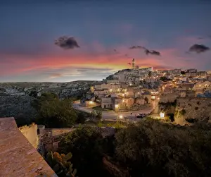 Sunset on the ancient town and historical center called Sassi, perched on rocks on top of hill