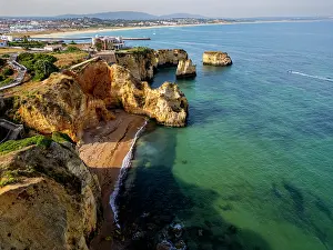 Geological Prints: Sunset over beach cliffs near Lagos in Algarve