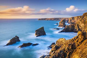 Sunset, Bedruthan steps sea stacks at high tide, Carnewas, Bedruthan, North Cornwall