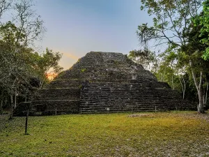 Management Prints: Sunset casts shadows on West Temple in Yaxha Archaeological Site in Peten Department