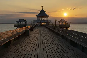 Glowing Prints: Sunset over Clevedon Pier and its pagoda, Clevedon, Somerset, England, United Kingdom