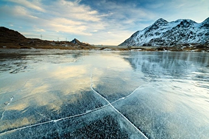Icescape Prints: Sunset on the frozen Lej Nair surrounded by snowy peaks