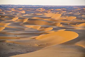 Sunset in the giant sand dunes of the Sahara Desert, Timimoun, western Algeria, North