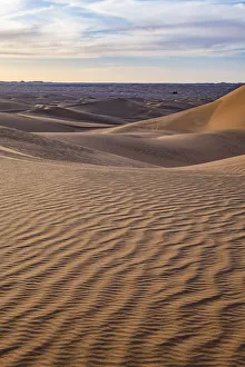 Barren Prints: Sunset in the giant sand dunes of the Sahara Desert, Timimoun, western Algeria, North