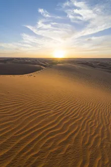 Sunset in the giant sand dunes of the Sahara Desert, Timimoun, western Algeria, North
