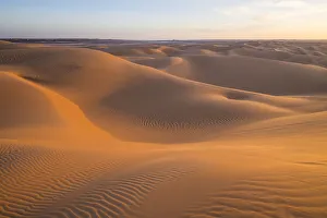 Sunset in the giant sand dunes of the Sahara Desert, Timimoun, western Algeria, North