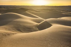Sunset in the giant sand dunes of the Sahara Desert, Timimoun, western Algeria, North