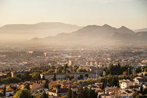 Granada Prints: Sunset above Granada looking north to Cartuja with the mountains of Parque Natural Sierra de Huetor