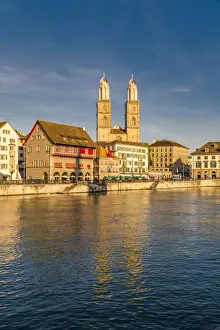 Rippled Prints: Sunset over Grossmunster Cathedral and Limmatquai street along the banks of Limmat River