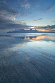 Sunset over the Isle of Rhum, from Bay of Laig, Scotland, United Kingdom, Europe
