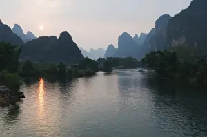 Guilin Prints: Sunset over karst limestone scenery on the Li river (Lijiang) in Yangshuo