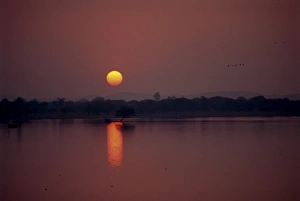Deo Garh Prints: Sunset over lake created by dam