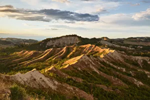 Badlands Prints: Sunset light on the Italian badlands named Calanchi, Emilia Romagna, Italy, Europe