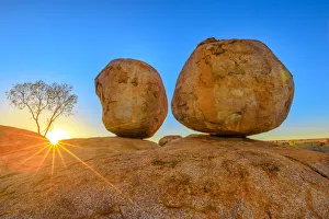 Northern Territory Prints: Sunset light rays at Devils Marbles, the Eggs of mythical Rainbow Serpent, at Karlu Karlu