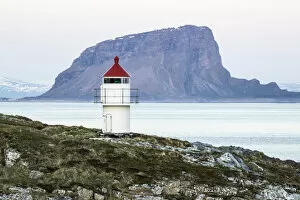 Nordland County Gallery: Sunset over the lighthouse in the fishing town of Trana, located on the Arctic Circle