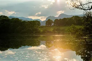Sunset at Loughrigg Tarn near Ambleside in The Lake District National Park, Cumbria