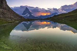 Mountain Peak Prints: Sunset over the Matterhorn reflected in lake Riffelsee, Zermatt, canton of Valais