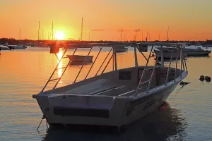 Grand Prints: Sunset overlooking boats at Grand Baie in Mauritius during a calm evening