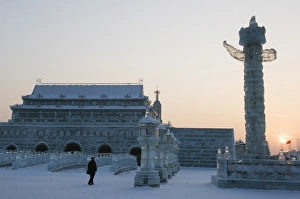 Images Dated 2nd February 2008: Sunset and replica Forbidden City ice sculpture at the Ice Lantern Festival