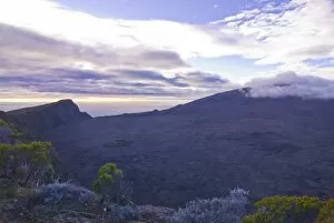 Sunset over the rim of the Volcano of Piton de la Fournaise, La Reunion