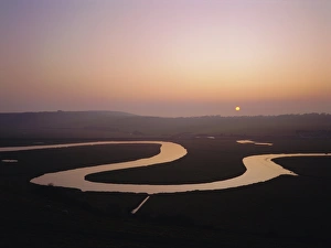 Sunset over the River Cuckmere at Cuckmere Haven, East Sussex, England, UK, Europe