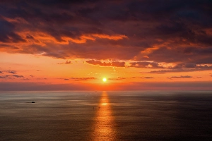 Watercraft Prints: Sunset on the sea with two boats crossing the sunset reflection on the sea, Greece