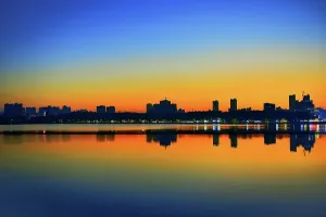 Jiujiang Prints: Sunset silhouette of Jiujiang City over Bali Lake, Jiangxi Province, China