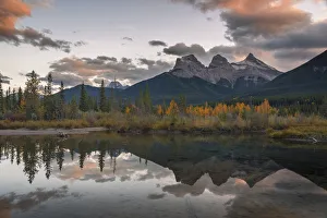 Rocky Mountains Prints: Sunset over Three Sisters in Autumn near Banff National Park, UNESCO World Heritage Site