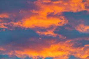 Antarctic Prints: Sunset skies display rich colors over the Antarctic Peninsula near Stonington Island in the Southern Ocean