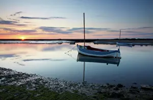 Sunset in spring at Burnham Overy Staithe on the North Norfolk Coast, Norfolk