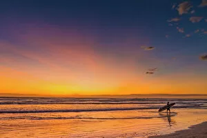 Costa Rica Gallery: Sunset & surfer at Playa Guiones beach, Nosara, Nicoya Peninsula, Guanacaste Province, Costa Rica