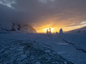 Polar Climate Prints: Sunset over an unusual iceberg near Petermann Island, Antarctica, Polar Regions